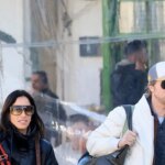 Brad Pitt and Inés de Ramón Have Opposing Ideas on Travel-Friendly Fashion