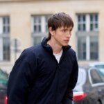 Harris Dickinson Hops Aboard the Bag Boy Trend