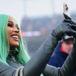 Cardi B’s Bejeweled Super Bowl Manicure Deserves Its Own Trophy