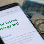 British energy bills to fall as price cap cut by 7%