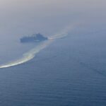 US warns Iran to make a deal as it steps up military deployments