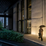 What is Nuveen and why is it buying Schroders?