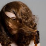 How to Straighten Curly Hair Safely, According to Experts