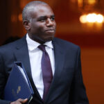 Government overcomes backbench rebellion to pass jury plan