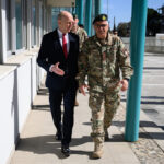 Defence secretary flies to Cyprus after criticism of UK response to attacks